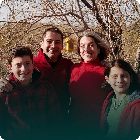 Rivera family with bird feeder